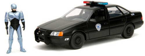 1:24 86 FORD TAURUS CHROME W/ ROBOCOP FIGURE - 1:24 86 Ford Taurus Chrome W/ Robocop Figure