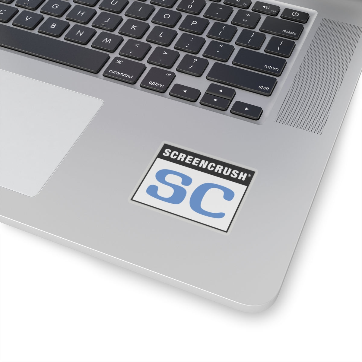 transparent sticker with SC rating in blue shown on laptop