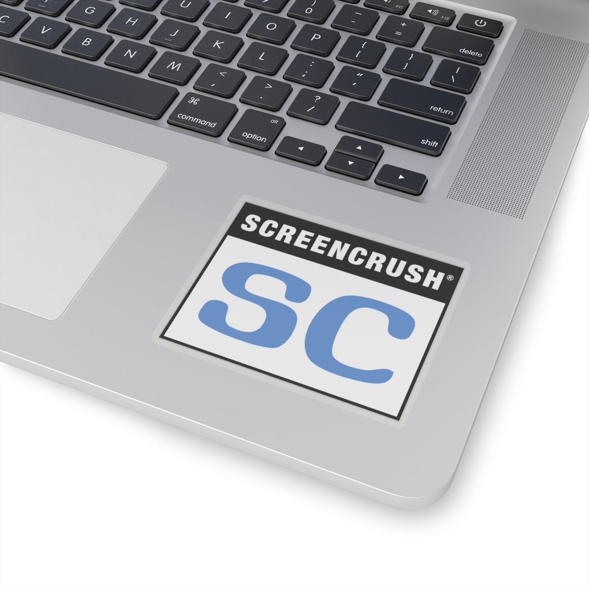transparent sticker with SC rating in blue shown on laptop
