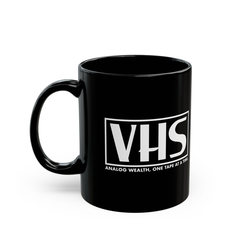 black coffee mug featuring VHS analog wealth design in white
